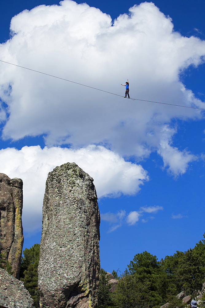 A man of France, walks on the slackline in Los Monjes valley near Creel, Chihuahua, Mexico