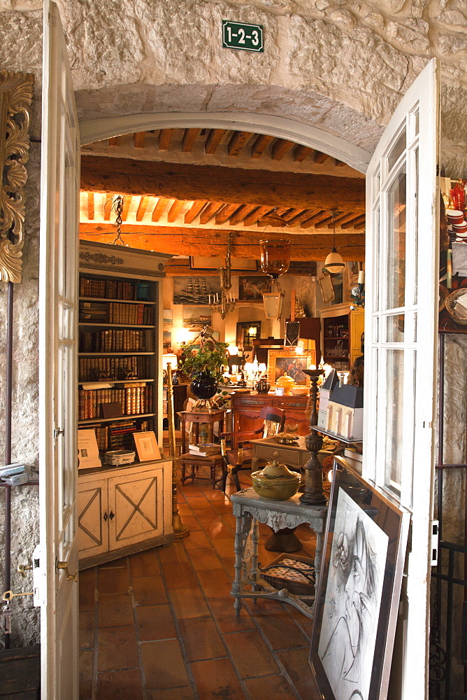 Entrance to the Pierre Laudoueneix Antiquites shop at the l'hotel Dongier in L'Isle-sur-la-Sorgue in Provence, Southern France. Known for its twice a week markets and numerous antique and design shops, this busy market town is high on the must-see list of visitors to Provence.