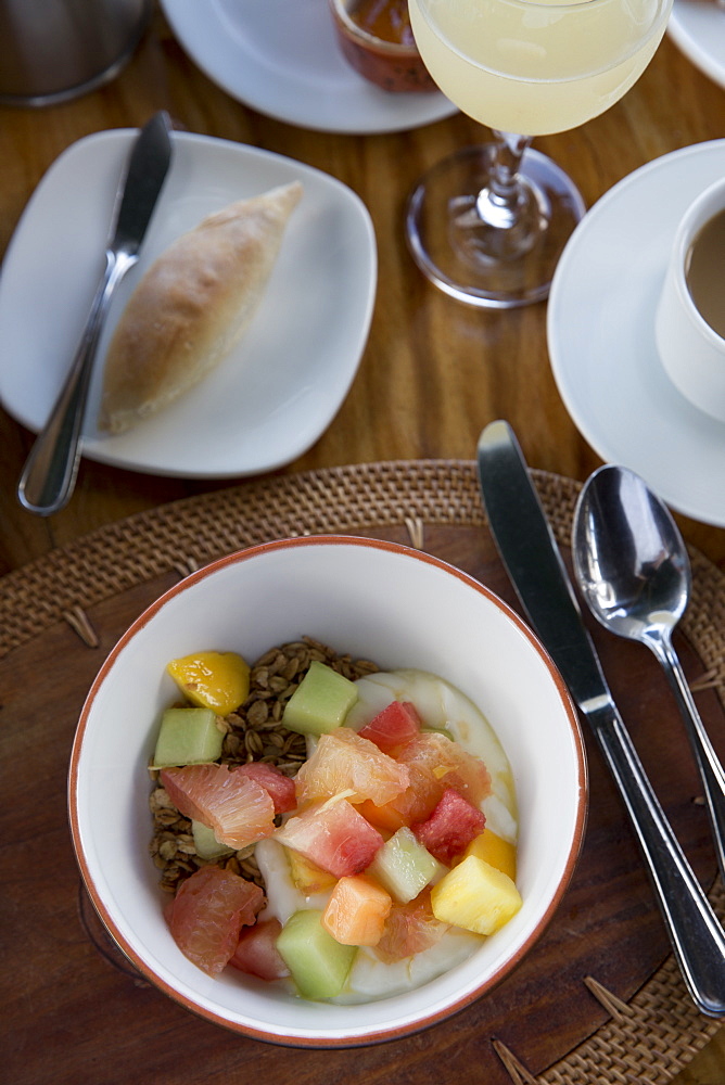 A breakfast spread of fruit and granola