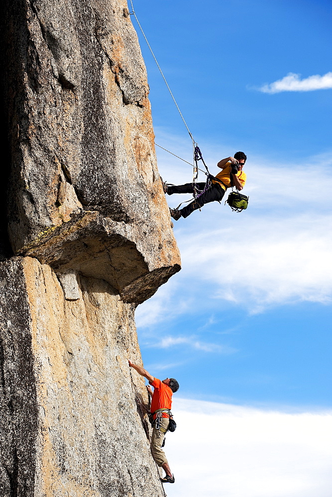 Corey Rich photographs Mitch Underhill on a climb on Lower Phantom Spire, South Lake Tahoe, CA, United States of America