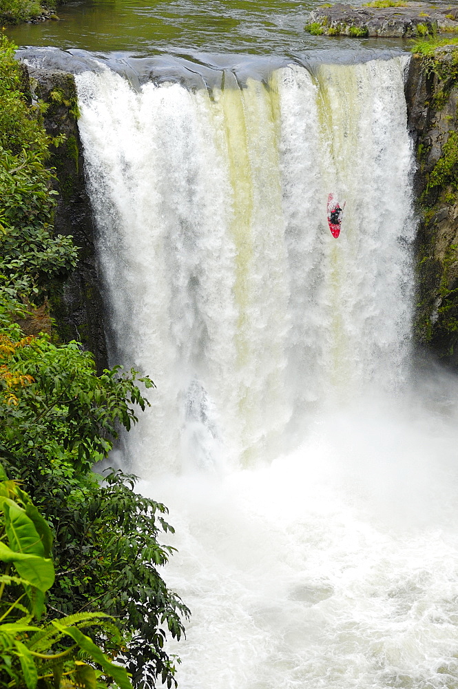 A man kayaks down a waterfall on the Alseseca River in the Veracruz region of Mexico, United States of America