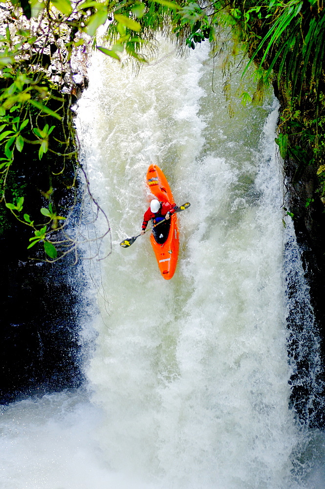 A man kayaks down a waterfall on the Alseseca River in the Veracruz region of Mexico, United States of America