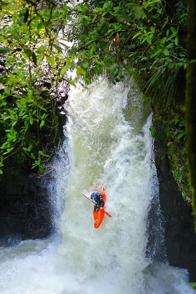 A man kayaks down a waterfall on the Alseseca River in the Veracruz region of Mexico, United States of America