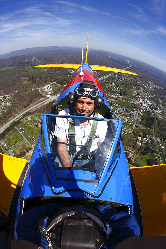 In flight view of a pilot in a Boeing PT-17 Stearman aircraft over Fayetteville, WV