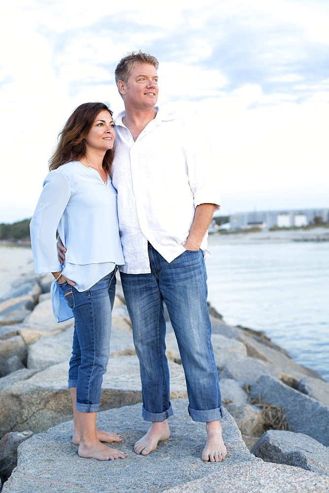 A couple are photographed at a Cape Cod beach, Dennis, Massachusetts, United States of America