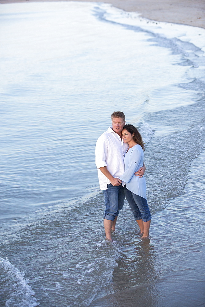 A couple are photographed at a Cape Cod beach, Dennis, Massachusetts, United States of America