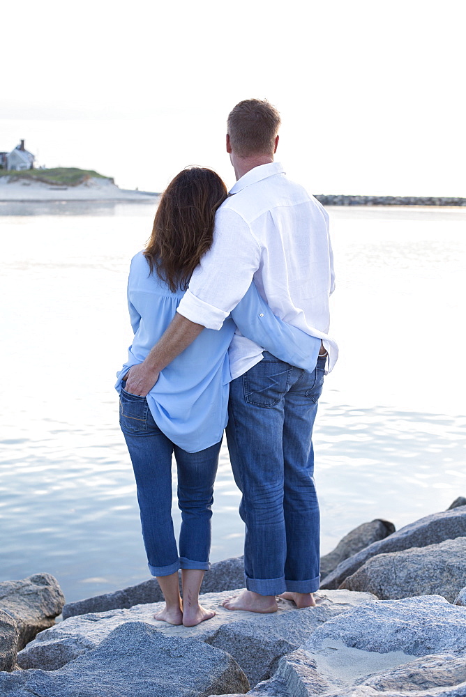 A couple are photographed at a Cape Cod beach, Dennis, Massachusetts, United States of America