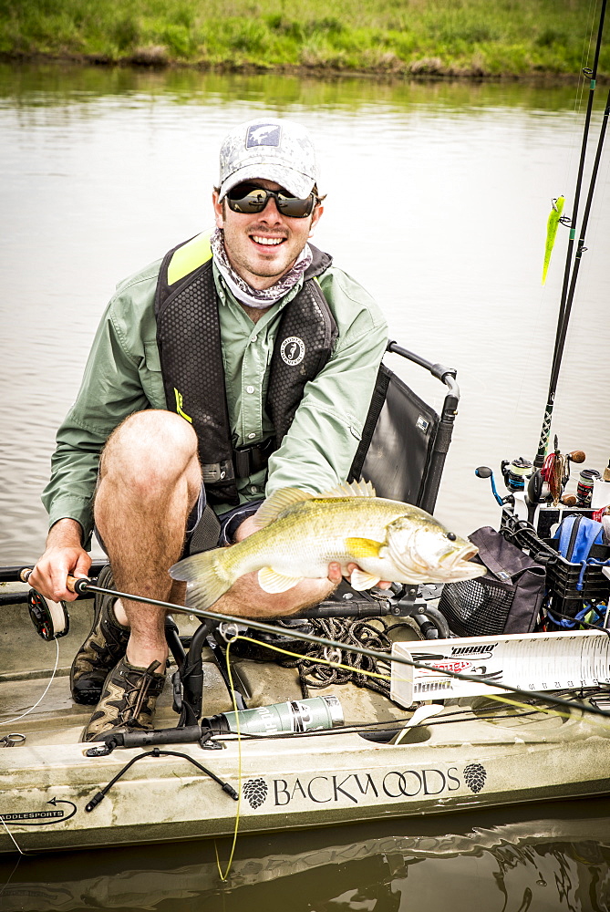 Holding up a trophy bass