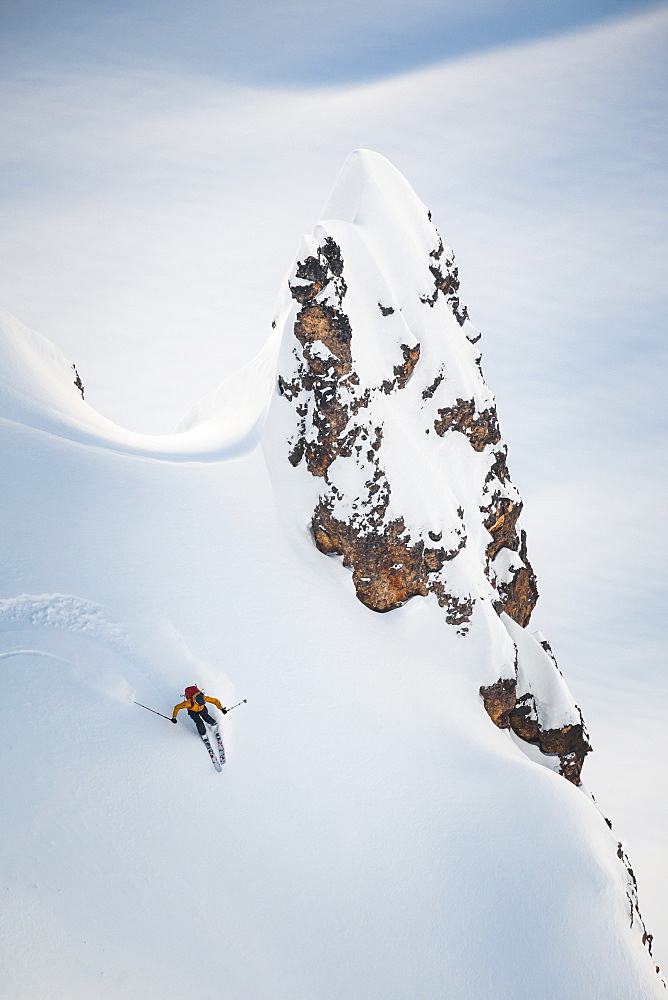 Person Skiing On Snowy Slope Near Elfin Lakes In Garibaldi Provincial Park, Canada