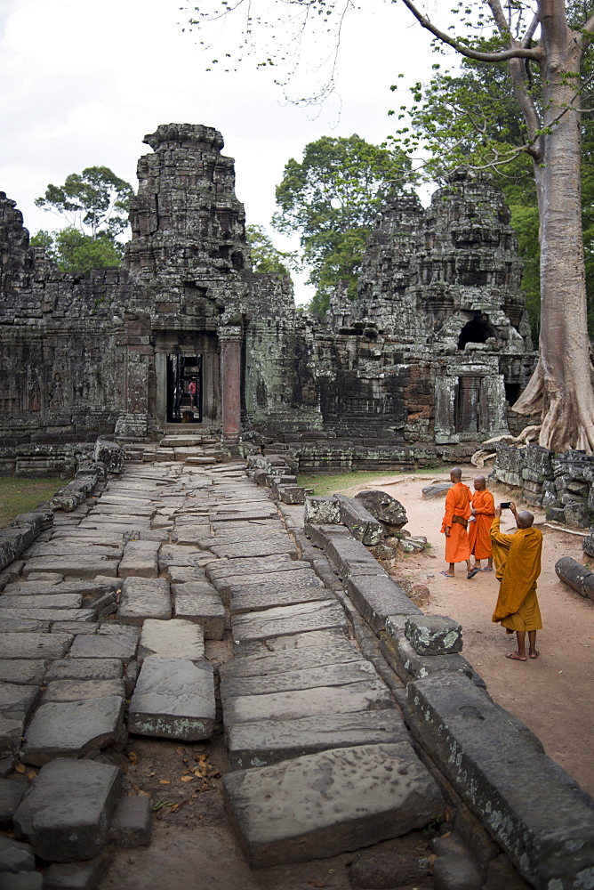 Buddhist Monks At The Banteay Kdei Temple At The Angkor Wat Complex, Siem Reap, Cambodia