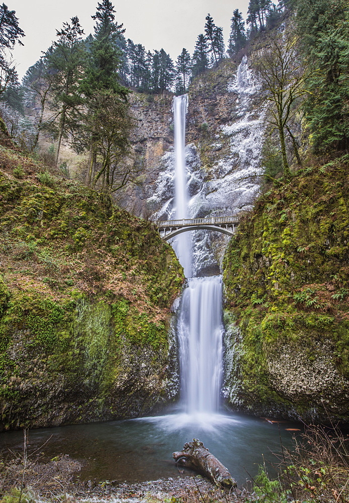 Multnomah Falls Over Rocky Hillside In Portland, Oregon, Usa