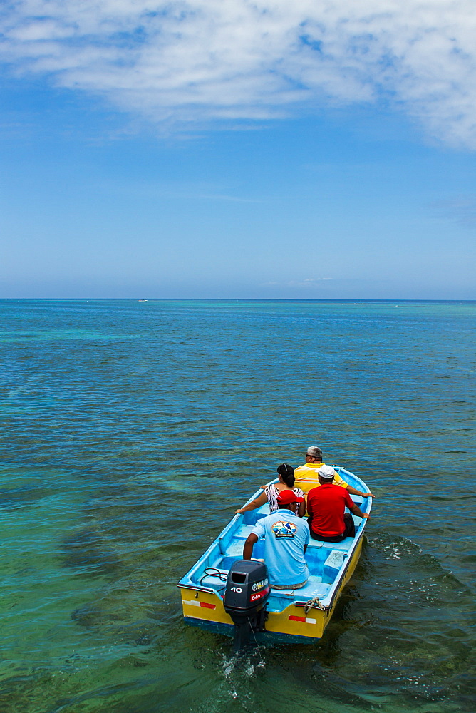 Passengers take a Water taxi from a dock at West End to West Bay Roatan, Honduras.