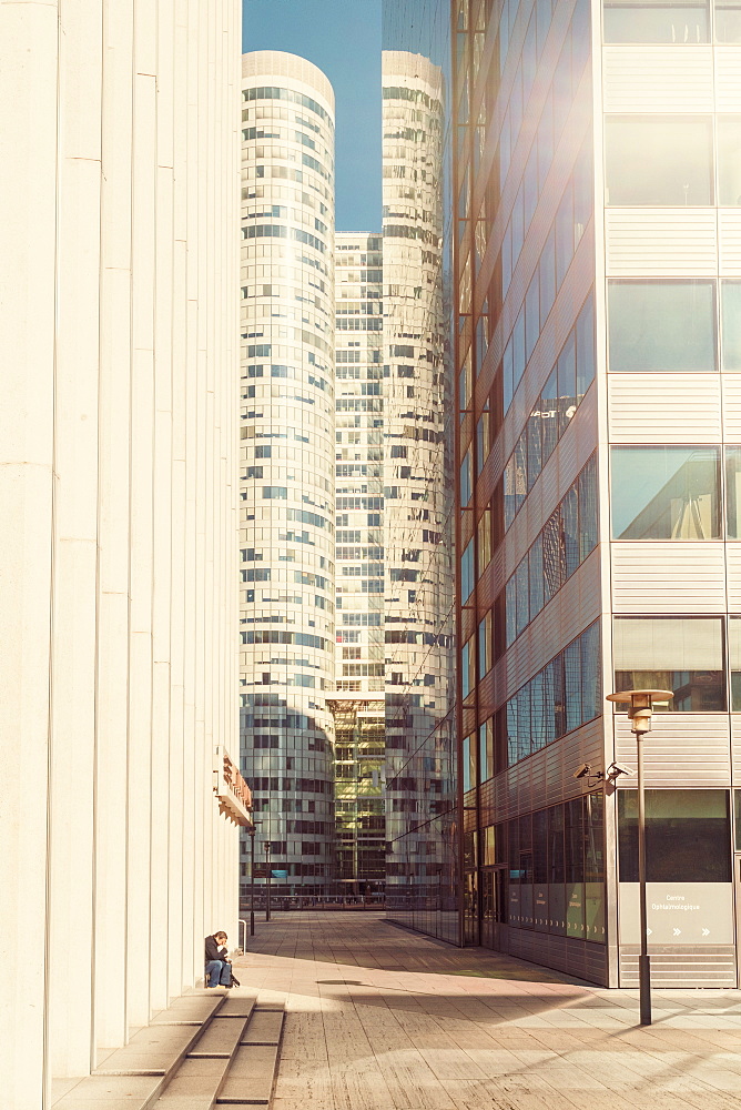 Modern architecture and towers, skyscrapers in La Defense. La Defense is a major business district, three kilometers west of the city limits of Paris, France