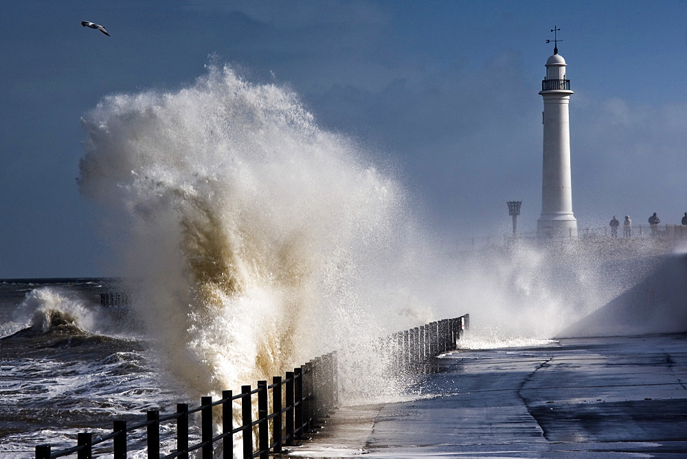 Waves Crashing By Lighthouse At Sunderland, Tyne And Wear, England, United Kindgom