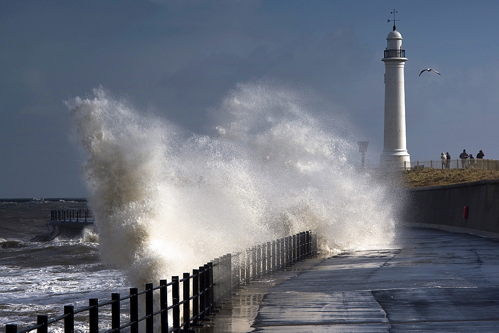 Waves Crashing By Lighthouse At Sunderland, Tyne And Wear, England, United Kingdom