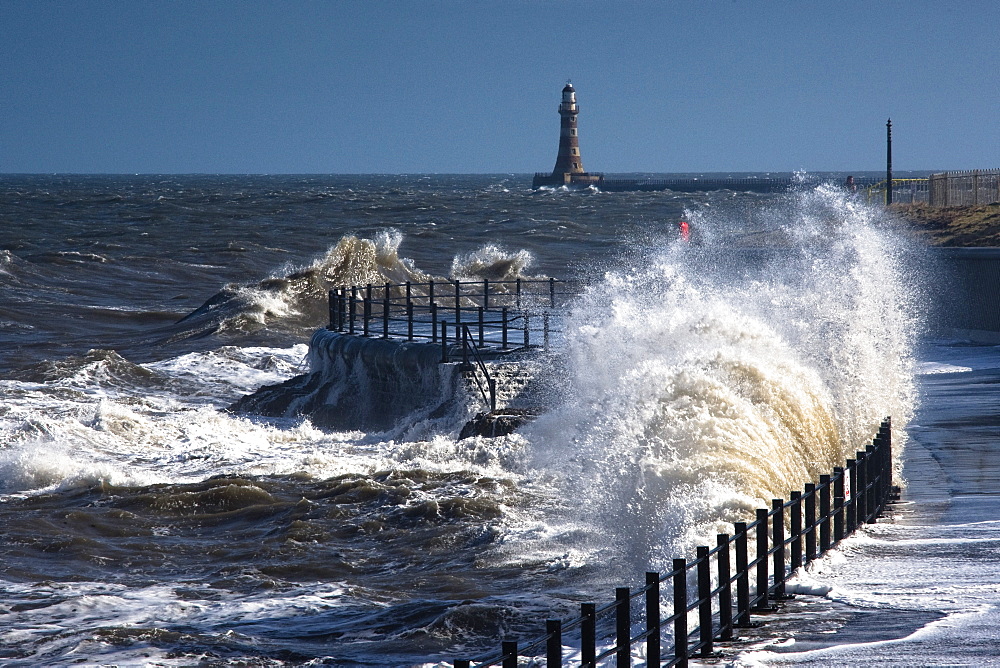 Waves Crashing By Lighthouse At Sunderland, Tyne And Wear, England, United Kingdom