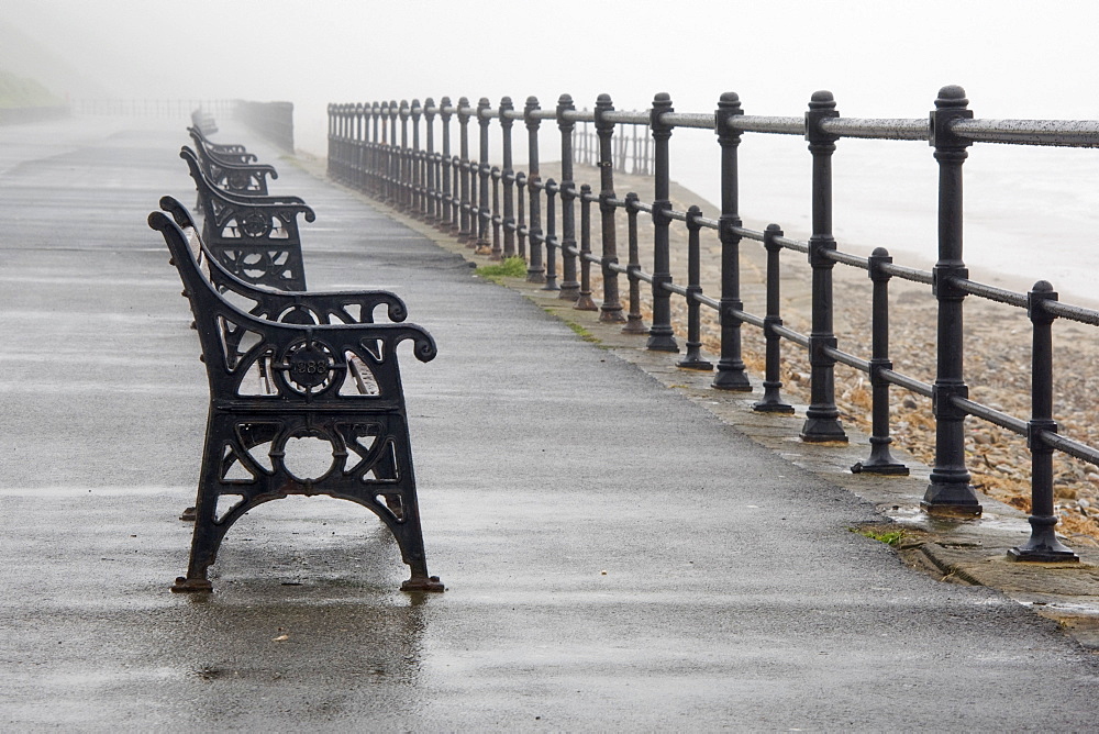 Redcar, North Yorkshire, England, Row Of Benches Overlooking The Beach And Sea