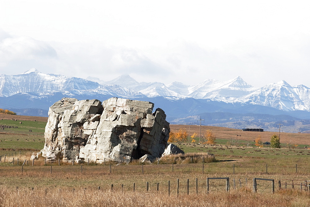 Big Rock And Mountains, Alberta, Canada