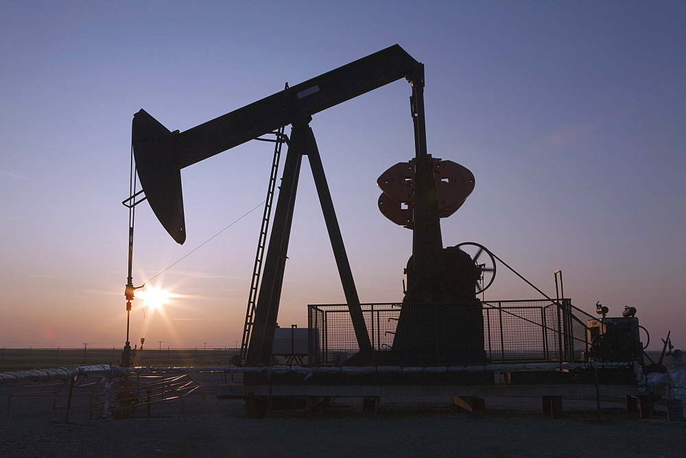 Pumpjack And Sunrise, Central Alberta, Canada