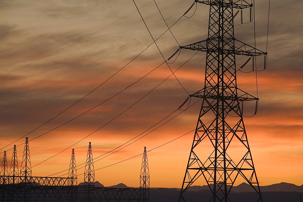 Calgary, Alberta, Canada, Electricity Towers And Wires At Sunset