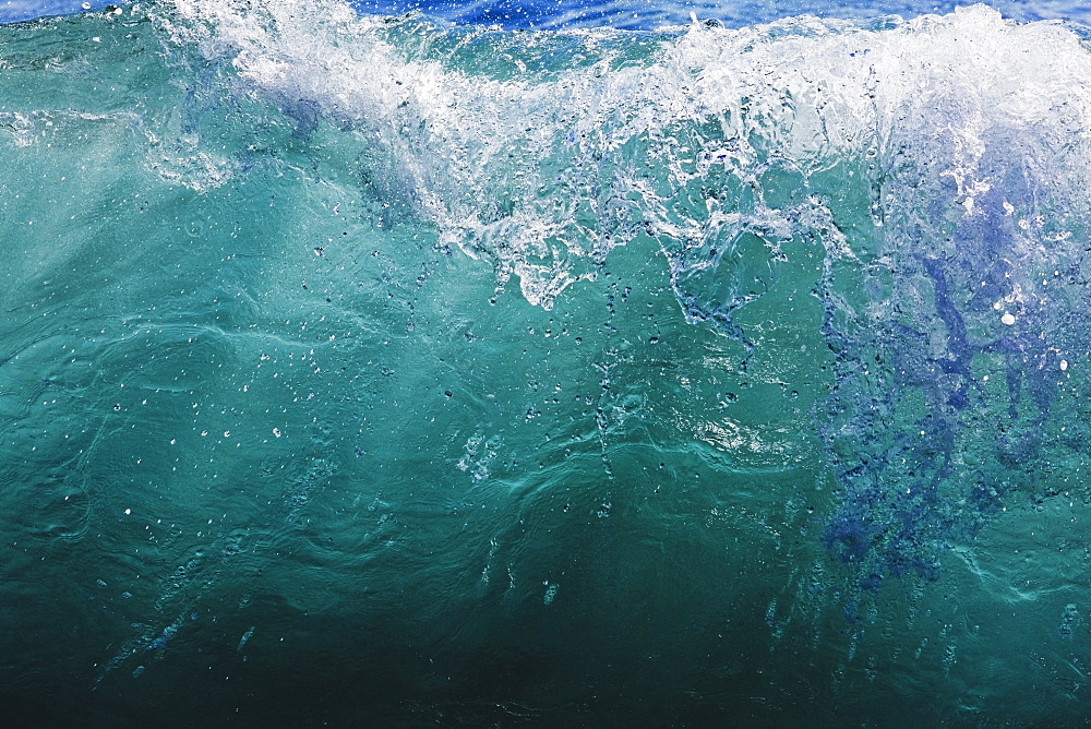 Hawaii, United States Of America, Sunlight Forms Rays In Sea Water Just As Wave Breaks