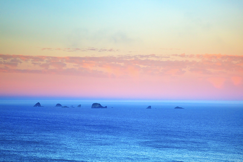 Sunrise Over Rock Formations At Cape Blanco, Oregon United States Of America
