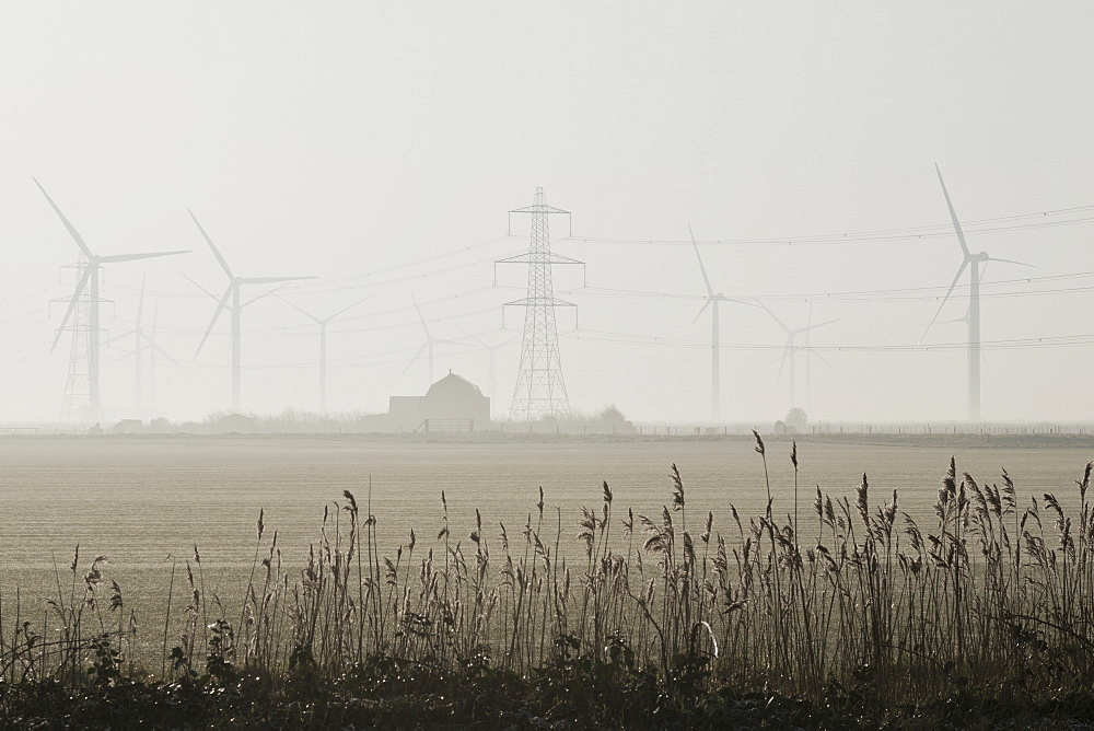 Misty morning at the little cheyne court wind farm at romney marsh, Kent east sussex england