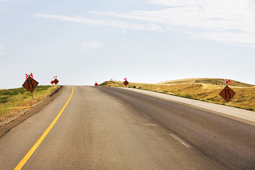 Signs warning of construction on the trans-canada highway, Saskatchewan canada