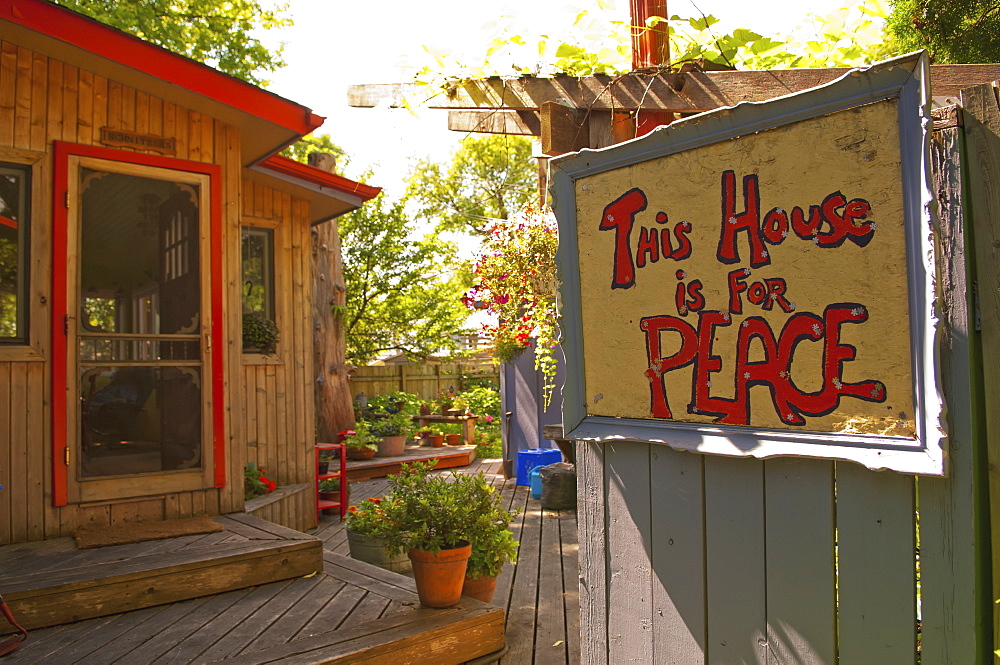 Home Garden With A Sign Saying This House Is For Peace, Winnipeg Manitoba Canada