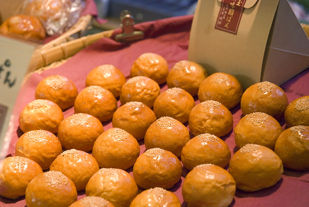 Tray of japanese buns in a street market, Kyoto japan