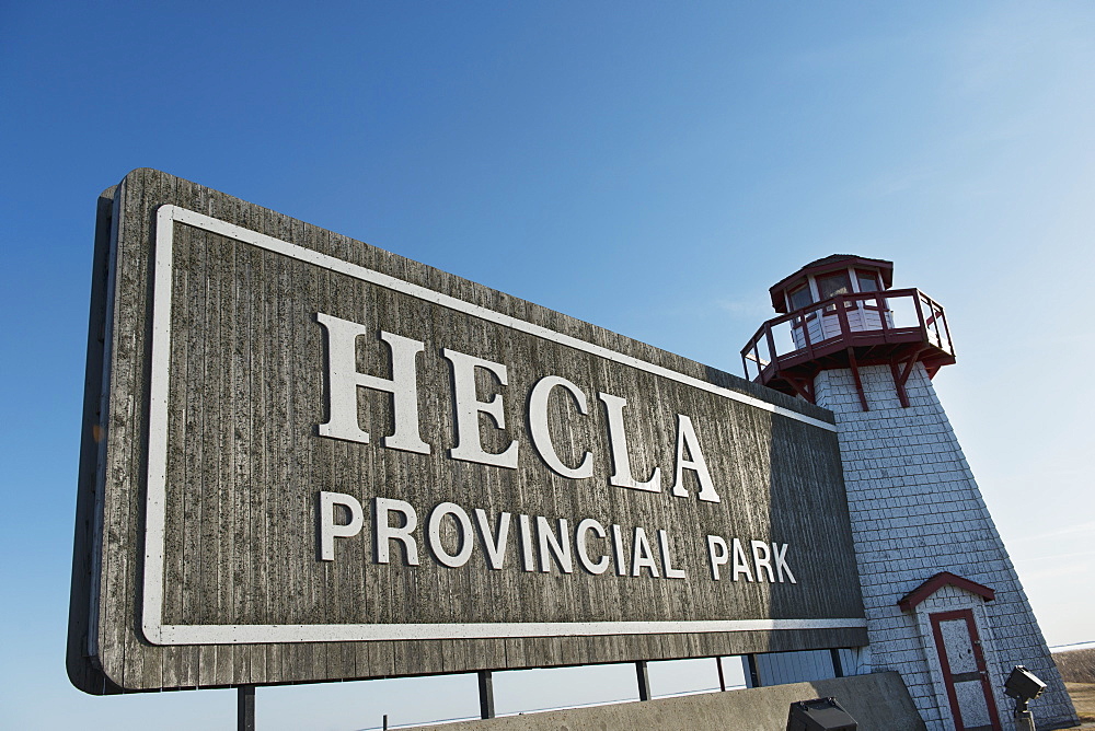 A Sign And Lighthouse For Hecla Provincial Park, Manitoba, Canada