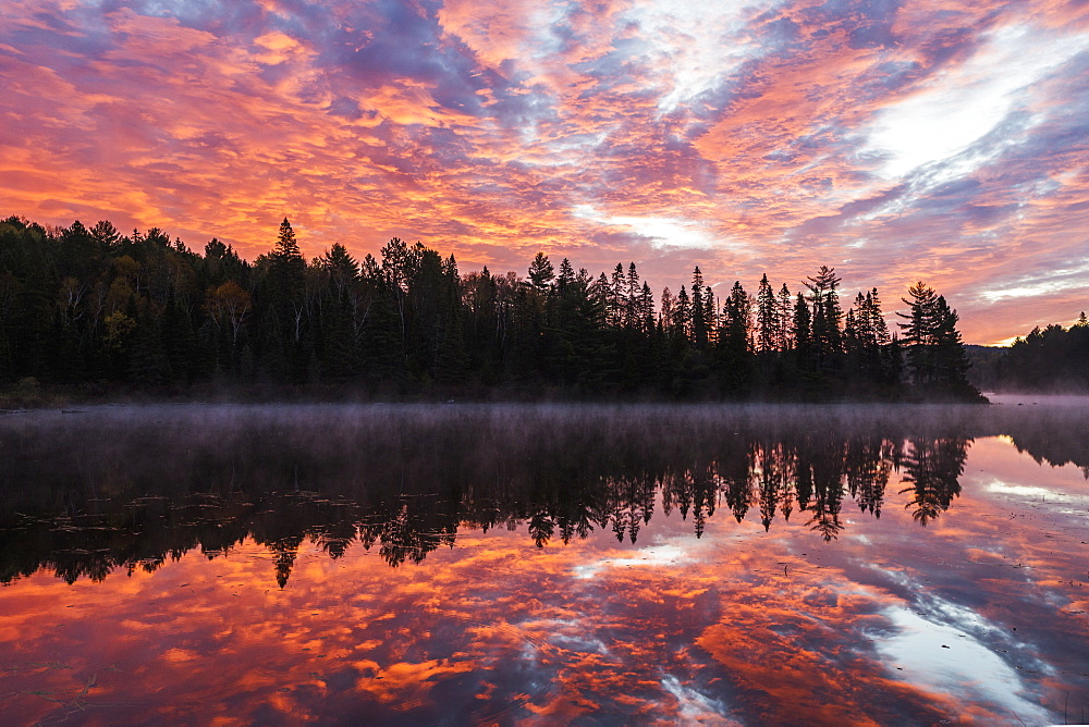 Red Clouds Light The Sky And Water Of Costello Lake, Algonquin Park, Ontario, Canada