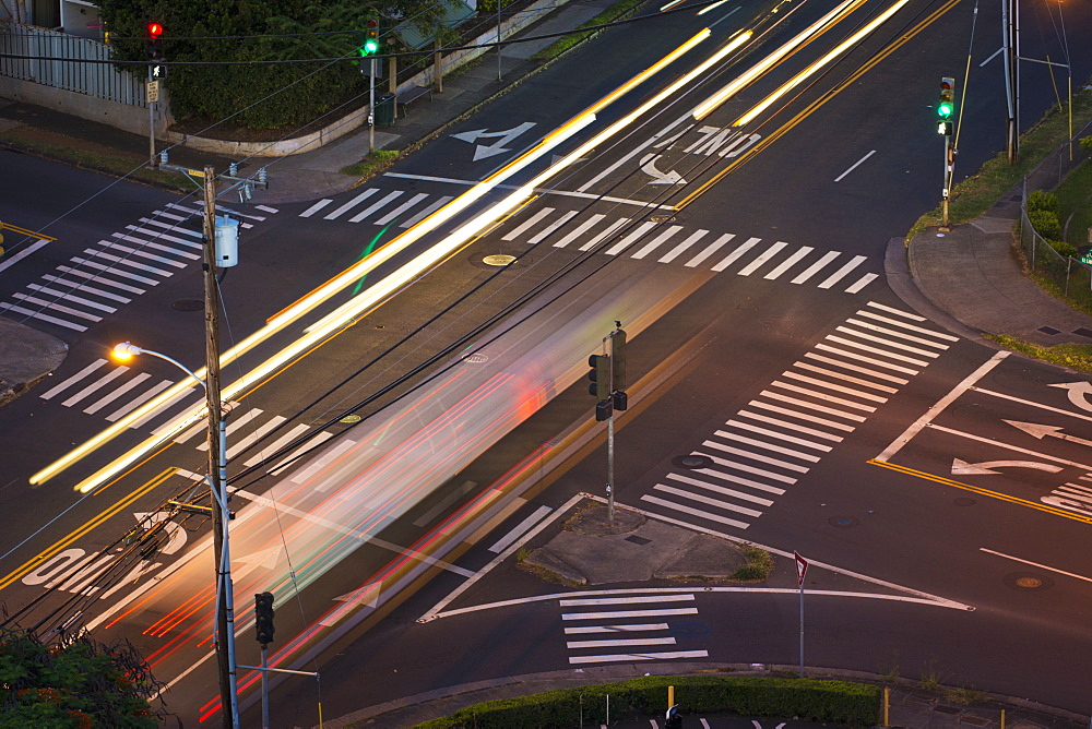 High Angle View Of An Intersection With Painted Arrows And Crosswalks, Honolulu, Oahu, Hawaii, United States Of America