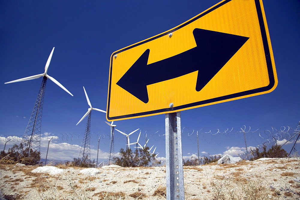 Wind Turbines And Road Sign, Palm Springs, California, United States Of America