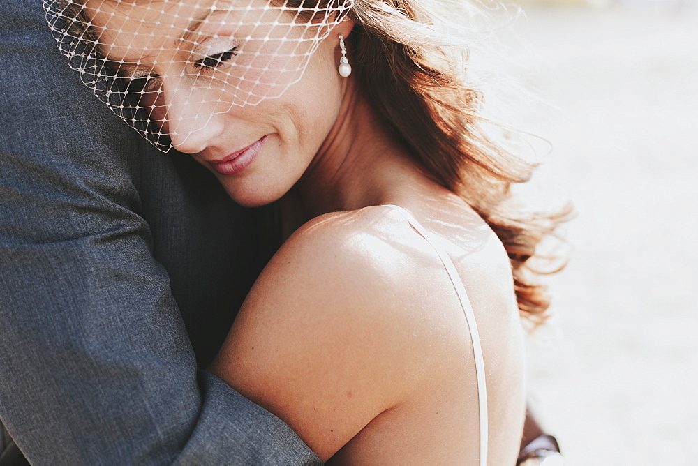 A bride and groom in an embrace, Kirkland washington united states of america