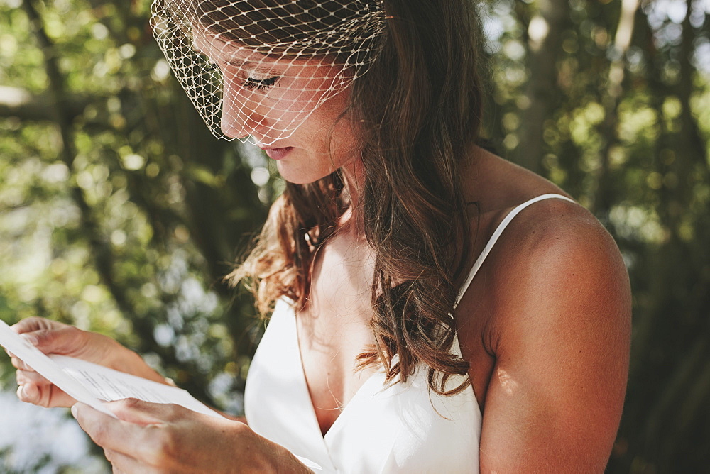 A bride reading from a piece of paper, Kirkland washington united states of america