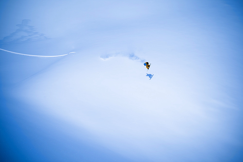 Extreme Snowboarding On A Snow Covered Slope, Haines, Alaska, United States Of America