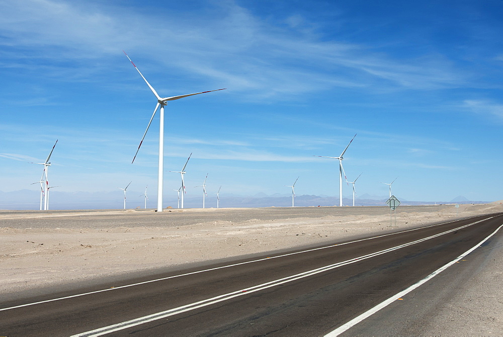 A Road Running Beside A Field Full Of Wind Turbines, Calama, Antofagasta Region, Chile