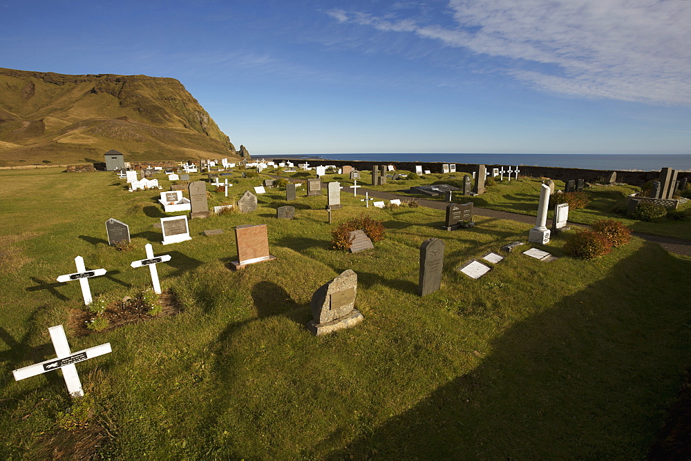 View Of A Graveyard Showing The Atlantic Ocean In The Background, Vik, Iceland