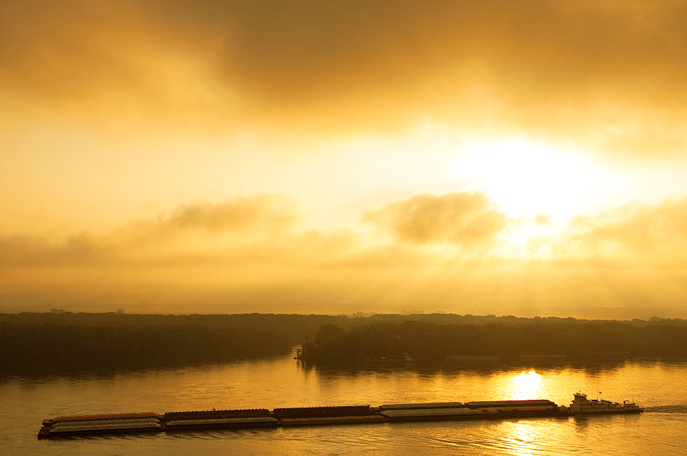 Agriculture - Grain Barge Navigating The Mississippi River In Early Morning Light / Near Hannibal, Missouri, Usa.