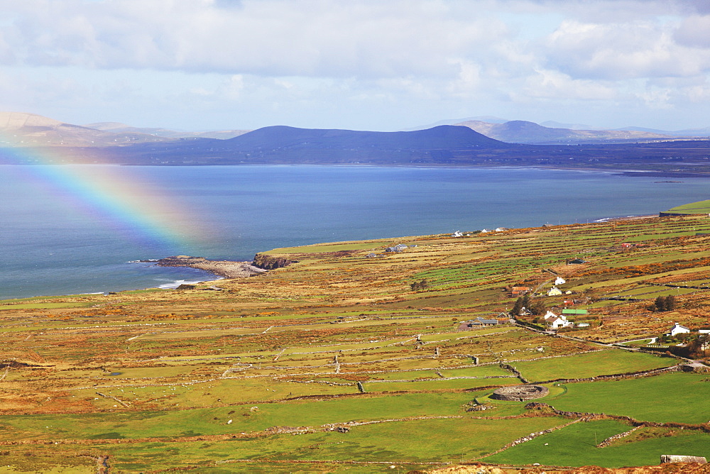 A Rainbow Off The Shoreline Over The Water, Near Waterville With Ballinskelligs Bay, County Kerry, Ireland