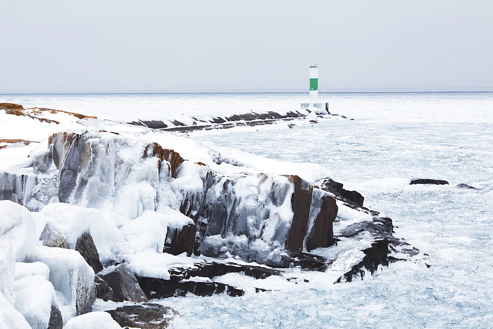 Ice On Lake Superior With A Lighthouse, Thunder Bay, Ontario, Canada