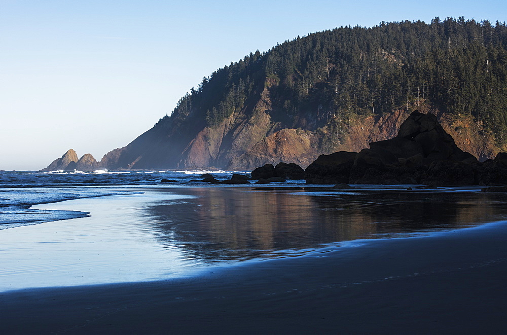 Morning Sunlight Warms Tillamook Head, Cannon Beach, Oregon, United States Of America