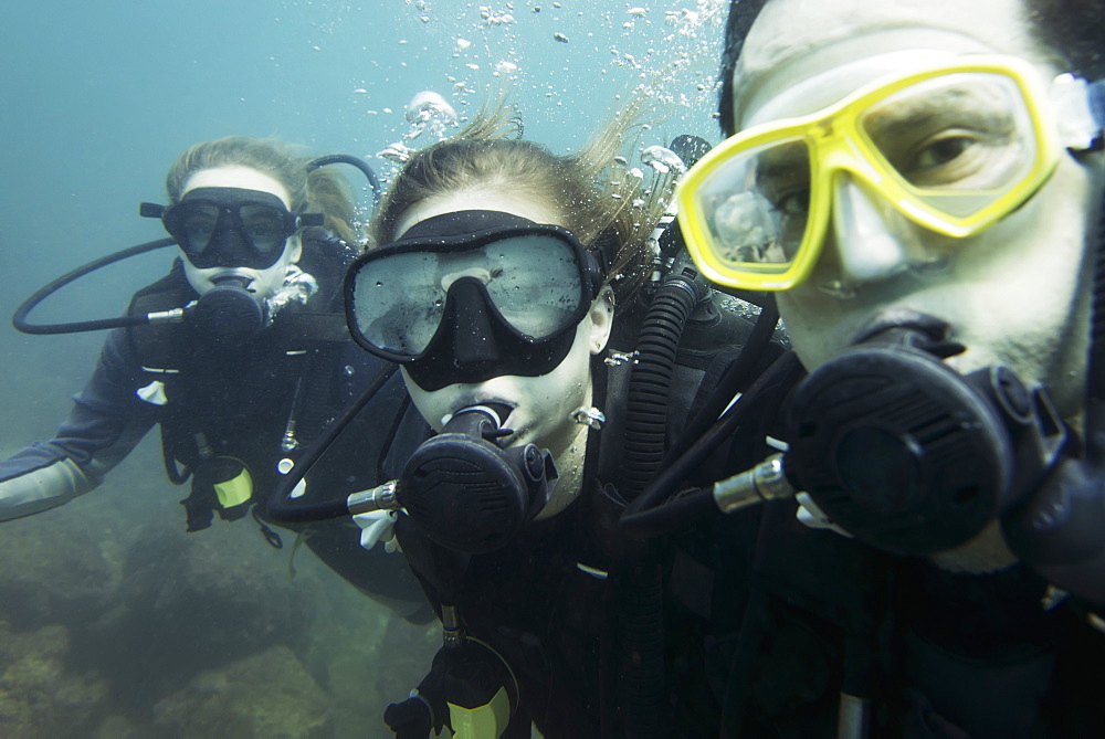 Scuba Divers Posing Underwater, Ixtapa-Zihuatanejo, Guerrero, Mexico