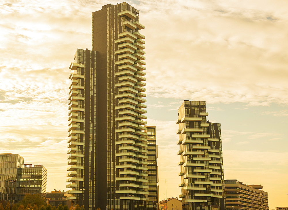 Skyscrapers Against Cloud At Sunset, Milan, Lombardy, Italy