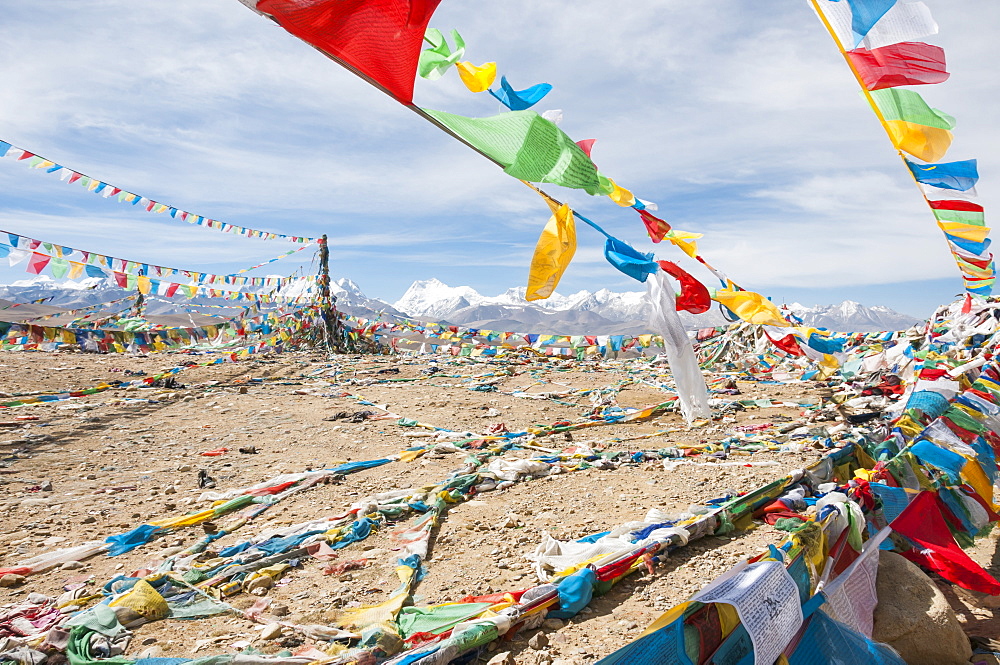 Traditional Tibetan Flags On The Mountain, Himalayas In The Background, Tibetan Friendship Highway, Tibet, China