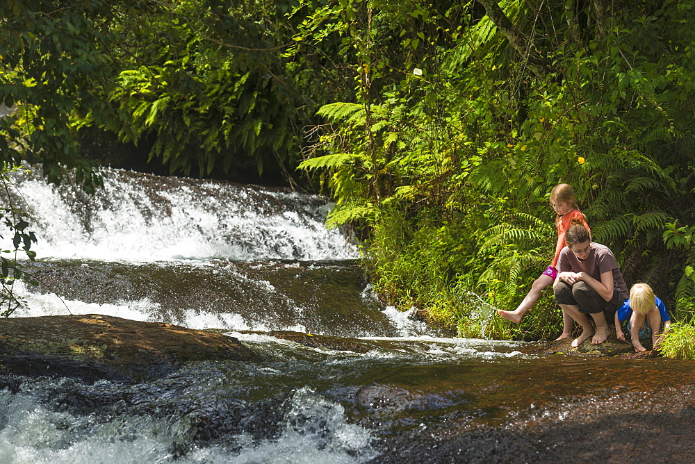 Mother With Boy And Girl Beside Small Waterfalls, Zomba Plateau, Malawi