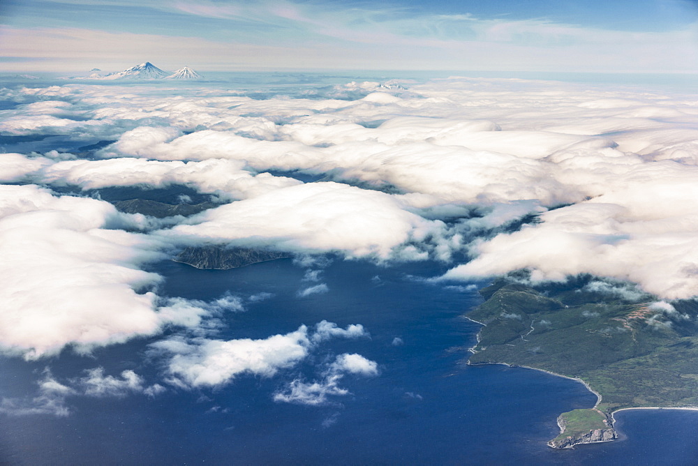 Aerial View Of Popof Island, Low Altitude Clouds Obscuring The Island, Sand Point, Southwestern Alaska, USA, Summer