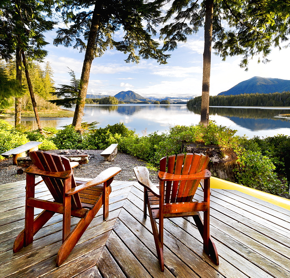 Wooden Adirondack Chairs On A Deck Overlooking The Water, Tofino Chalet On Jensen's Bay, Tofino, British Columbia, Canada