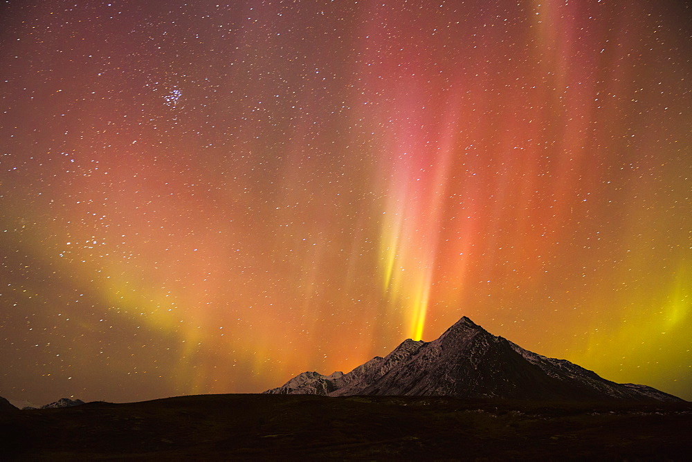 The Northern Lights (Aurora Borealis) Over Top Of Angelcomb Peak, Dempster Highway, Yukon, Canada